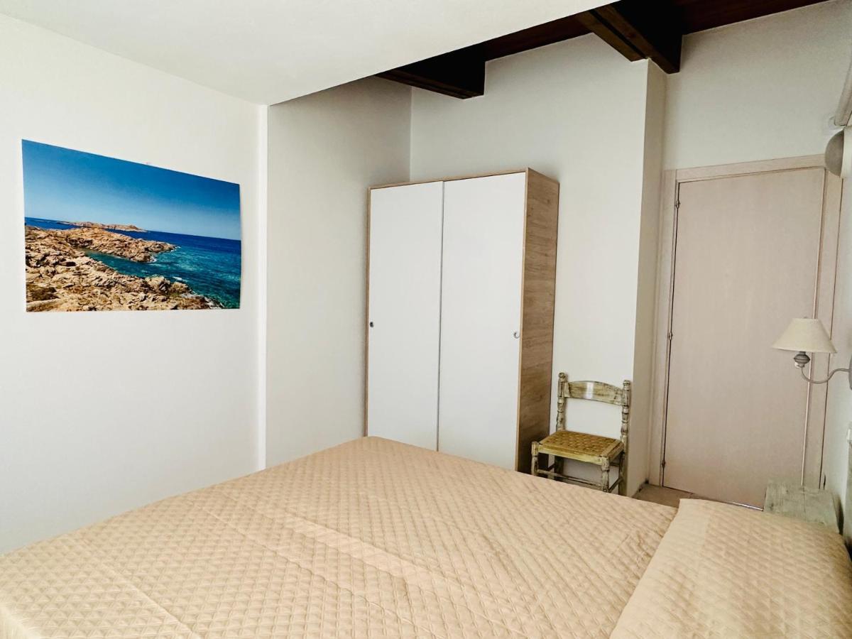 Approdo Apartments Isola Rossa Exterior foto