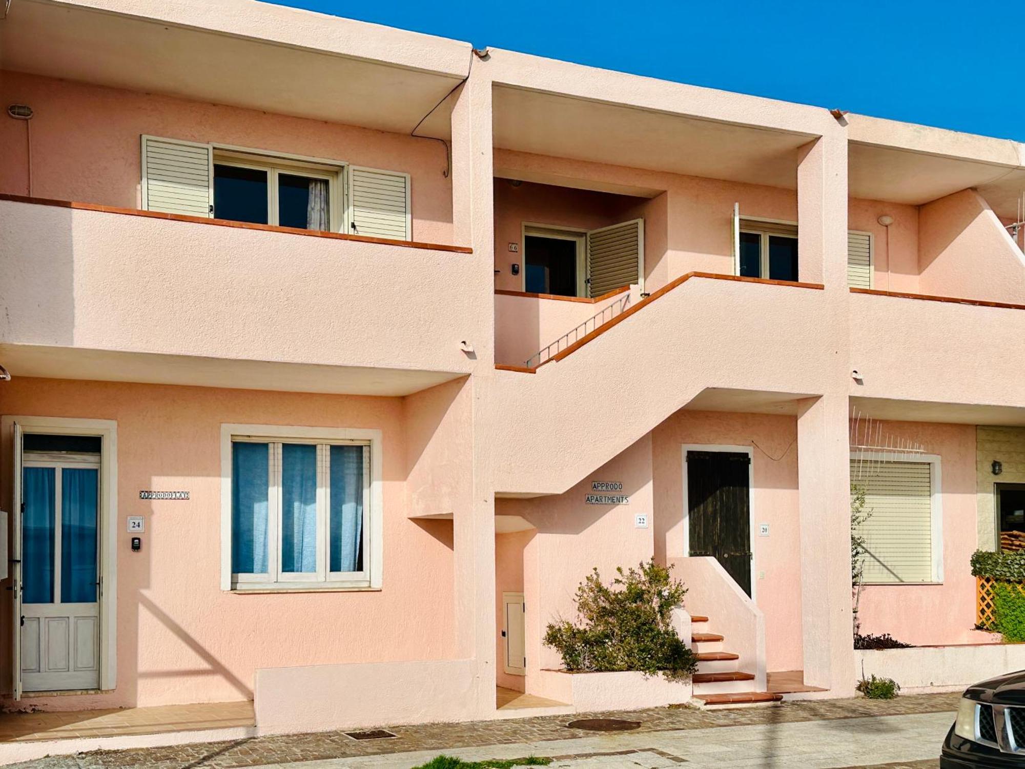 Approdo Apartments Isola Rossa Exterior foto