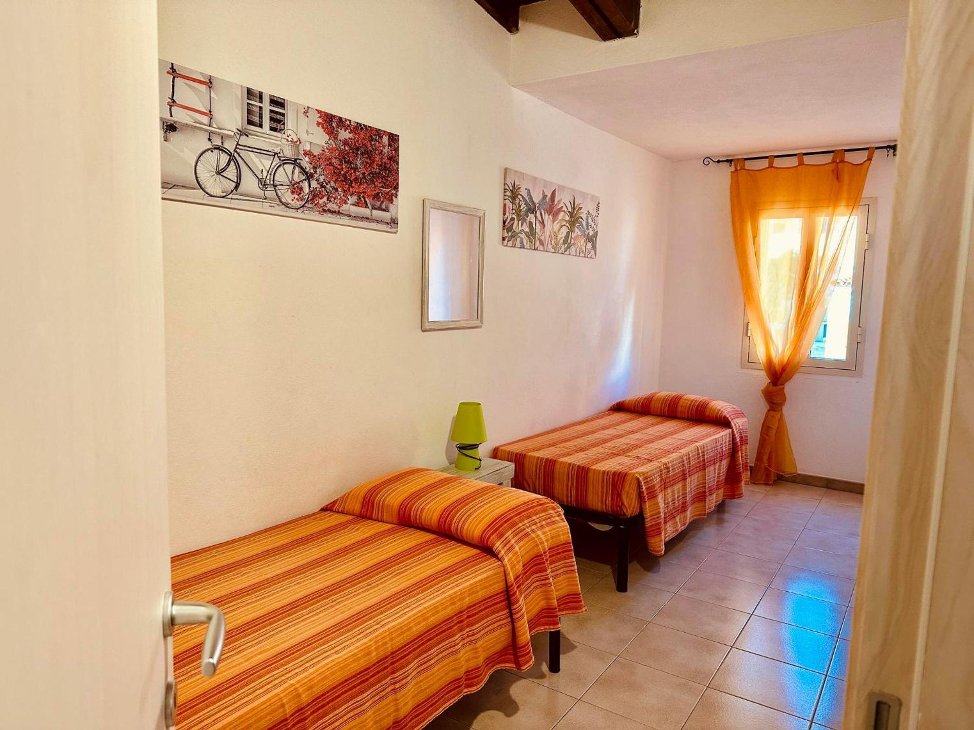 Approdo Apartments Isola Rossa Exterior foto