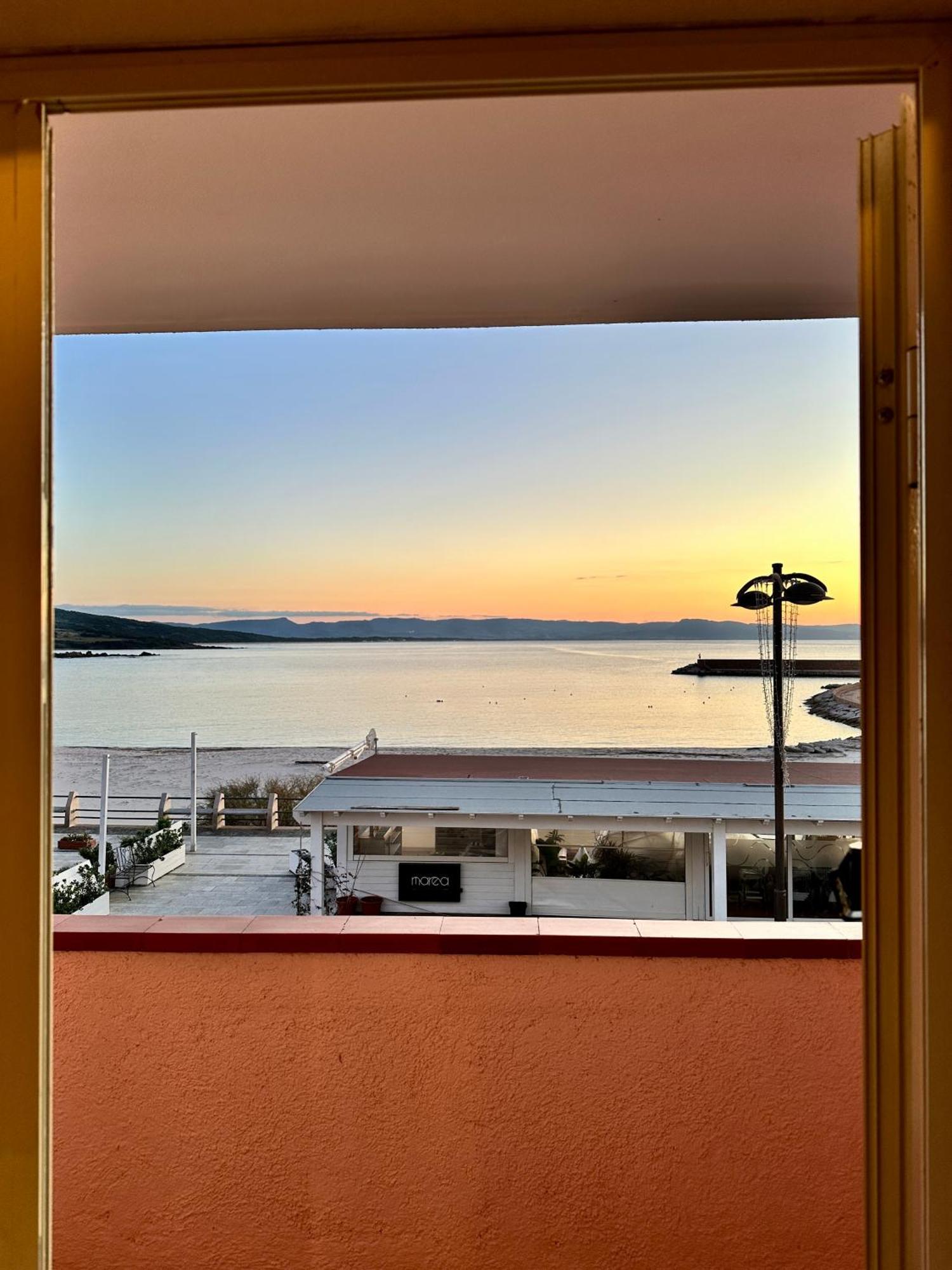 Approdo Apartments Isola Rossa Exterior foto